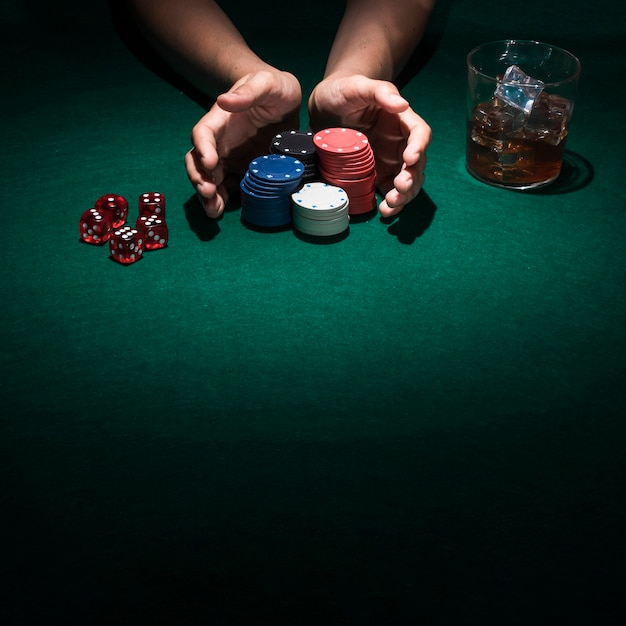 background,people,blue background,hand,green,blue,table,red,wine,black background,space,black,colorful,human,game,board,person,backdrop,white,ice