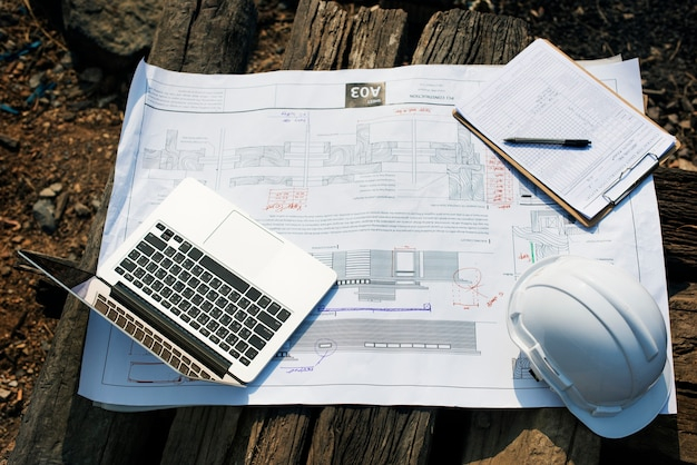 computer,building,paper,construction,laptop,digital,notebook,architecture,worker,engineering,safety,plan,engineer,helmet,career,project,site,blueprint,device,construction worker