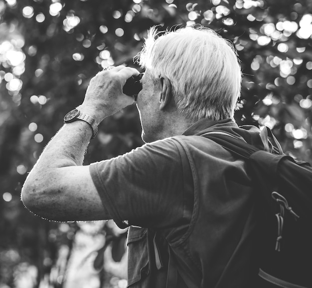 people,man,nature,bird,forest,black,holiday,white,birds,jungle,adventure,group,black and white,old,old people,old man,journey,navigation,activity,binoculars