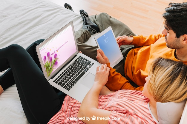 mockup,technology,computer,template,man,laptop,internet,couple,decoration,mock up,creative,tablet,modern,bed,decorative,connection,pc,bedroom,sitting,device