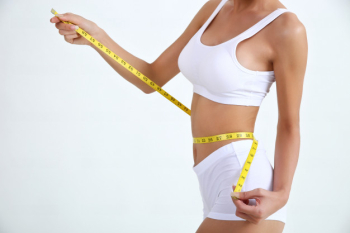 Healthy Female Body With Measuring Tape Stock Photo - Download