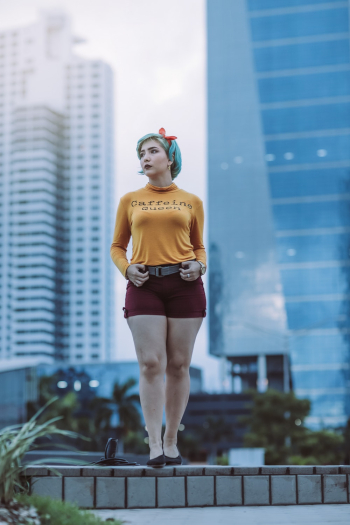 Woman With Teal Hair Wearing Red Supreme Shirt Grab by Person · Free Stock  Photo