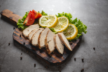 Raw Chicken Breast On A Wooden Cutting Board Stock Photo, Picture and  Royalty Free Image. Image 27433651.