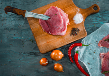 Raw Chicken Breast On A Wooden Cutting Board Stock Photo, Picture and  Royalty Free Image. Image 27433651.