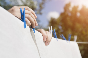 Free Photo  White laundry hanging on a string outdoors