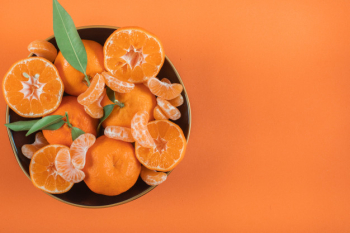 Fresh Mandarin Oranges Fruit With Leaves On Wooden Table. Stock Photo,  Picture and Royalty Free Image. Image 91454014.