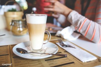 latte macchiato, pouring espresso in glass, pitcher with coffee, milk foam,  energy and caffeine Stock Photo by LightFieldStudios