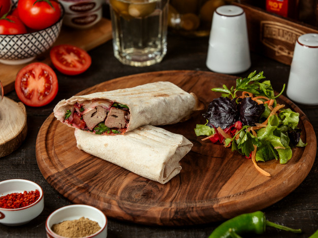 lavash,wrapped,grilled,doner,cuisine,turkish,cucumber,kebab,view,fresh,fast,wooden,salad,meat,board,food