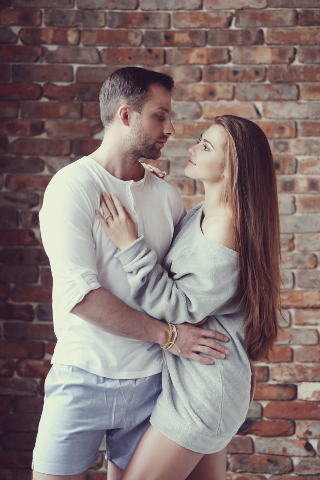 Free: Lovely couple hugging at home Free Photo 