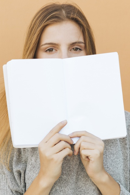 hiding,against,reader,confident,blonde,casual,surface,colored,looking,copy,pretty,one,adult,holding,beige,blank,positive,studying,peach,read,lifestyle,portrait,expression,beautiful,young,learn,female,knowledge,lady,reading,information,learning,mouth,modern,person,backdrop,white,study,face,space,idea,student,beauty,woman,education,book,people,background
