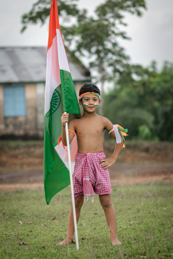 boy,child,daytime,flag,india,kid,posing