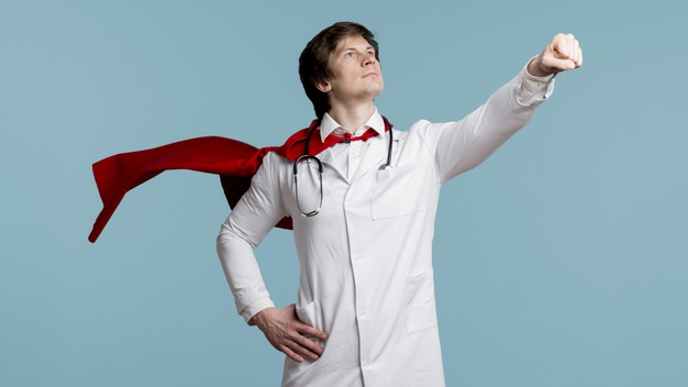 Free: Doctor with cape and blue background Free Photo - nohat.cc