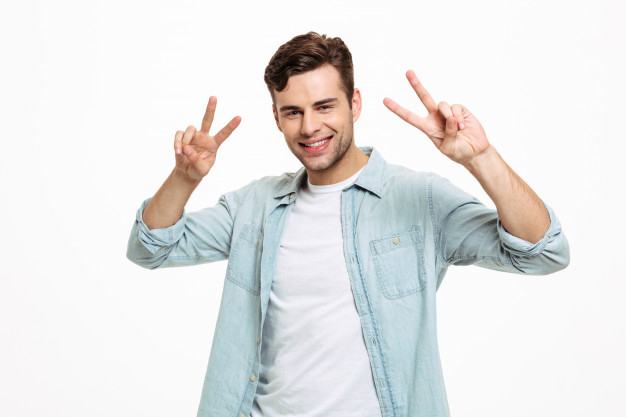 gesturing,caucasian,positivity,showing,satisfied,posing,attractive,confident,cheerful,casual,handsome,single,friendly,standing,satisfaction,adult,guy,gesture,male,positive,achievement,victory,happiness,young,win,model,peace,winner,success,happy,man