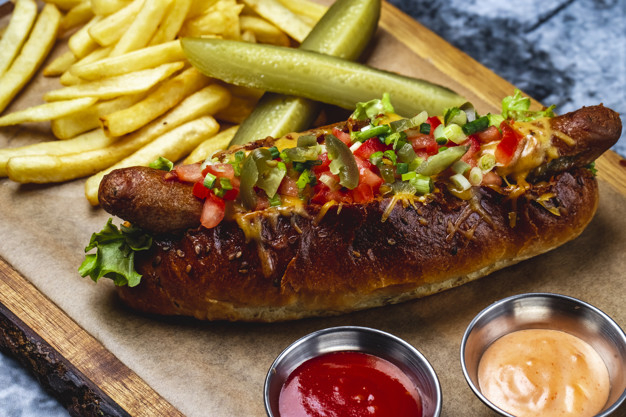pickled,sauces,grilling,melted,jalapeno,greens,grilled,bun,cucumber,fries,french,sausage,pepper,snack,beef,hot,tomato,dogs,barbecue,bbq,cheese,meat,board,dog,food