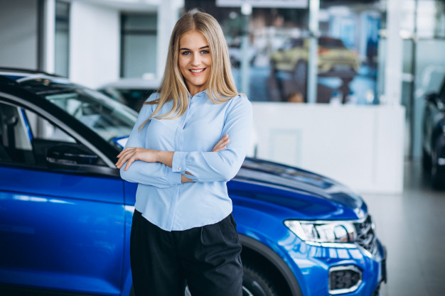salesperson,owner,cheerful,buying,excited,showroom,looking,purchase,pretty,adult,rent,automobile,positive,retail,driving,vehicle,driver,buy,young,test,female,transportation,customer,auto,insurance,service,transport,finance,happy,girl,woman,car,sale