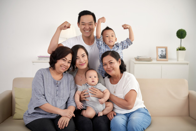 taiwanese,grandchildren,relatives,extended,mature,posing,around,vietnamese,bond,toddler,standing,big,generation,smiling,values,senior,couch,portrait,sitting,asian,grandmother,together,traditional,sofa,father,boy,mother,kid,home,man,woman,family,children,love,baby