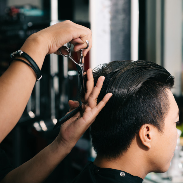 Free: Unrecognizable hairdresser cutting asian male customer's hair with  scissors in salon Free Photo 