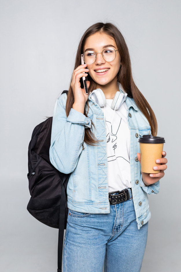 daylight,casual,freelancer,active,adult,geek,smart,backpack,young,female,college,talk,university,communication,smartphone,glasses,happy,shopping,student,office,girl,phone,fashion,woman,education,technology,school,coffee