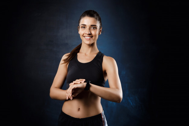 Fitness Girl Posing in the Gym Stock Photo - Image of people, dark