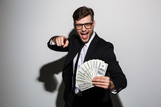 toothy,businessperson,caucasian,bristle,bearded,banknotes,posing,bunch,brunette,attractive,confident,cheerful,handsome,dollars,wear,pointing,formal,adult,holding,guy,successful,executive,professional,jacket,young,classic,suit,tie,employee,finger,success,businessman,elegant,glasses,shirt,happy,luxury,man,money,business