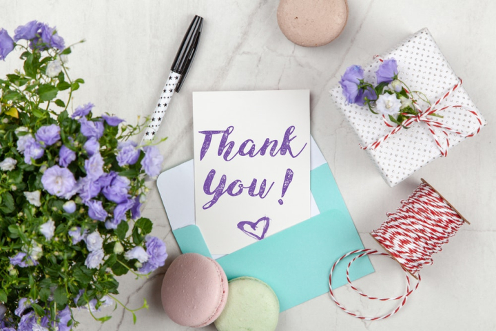 blooming,blossom,bright,card,close-up,colors,cookies,correspondence,creative,cup,design,desk,envelope,flora,flowers,greeting card,greetings,handmade,heart shape,indoors,lavender color,message,note,pen,thank,thank you,thread,violet,white background,writing,you