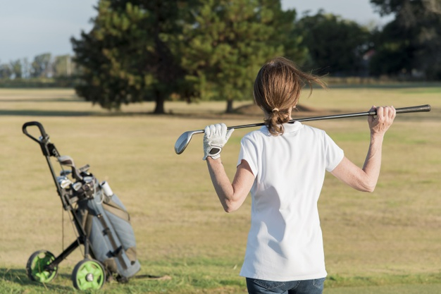 Free: High angle female playing golf Free Photo 