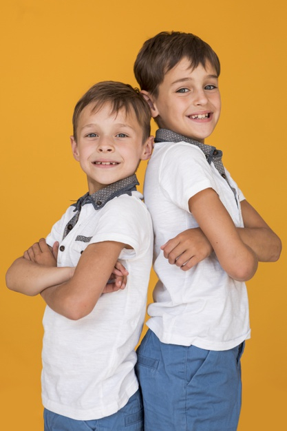 Little Brothers and Sisters Poses To Camera. Stock Image - Image of family,  bonding: 120848087