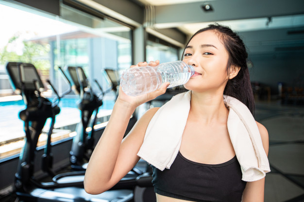 Sporty Teen With A Water Bottle After Exercise Stock Photo