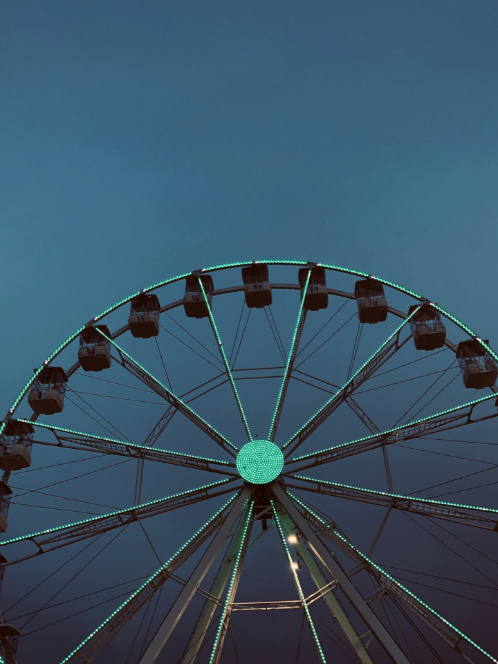 carnival,carousel,circus,entertainment,ferris wheel,fun,low angle shot,round,round out