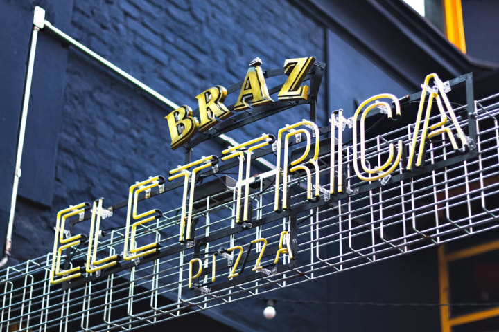 design,led lights,low angle shot,metal,outdoors,pizza,restaurant,signage