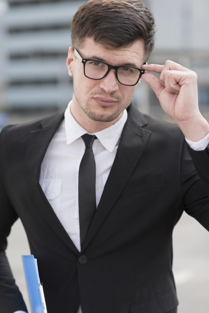 high angle,modern man,handsome,high,vertical,angle,formal,holding,male,clipboard,portrait,documents,young,outdoor,modern,businessman,glasses,man