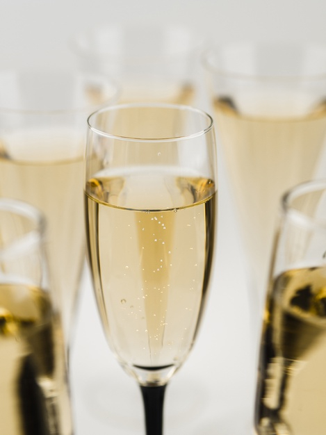 high angle,filled,sparkly,alcoholic,defocused,high,angle,close,up,liquid,year,alcohol,bubbles,new,champagne,drink,glass,glasses,celebration,wine,new year