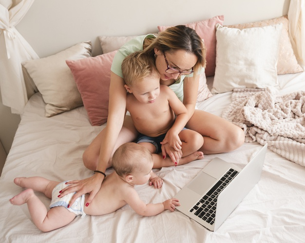 indoors,adorable,innocent,spending,toddler,childhood,horizontal,lovely,newborn,beautiful,macbook,youth,mother,time,laptop,cute,family,children,baby