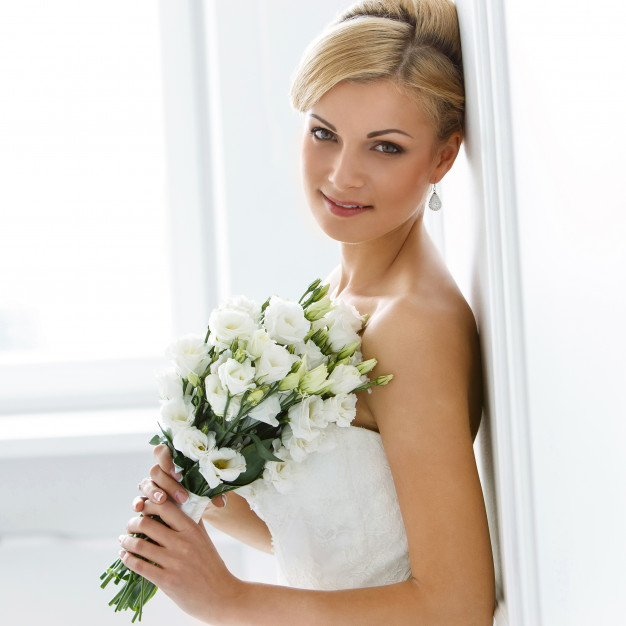closeup,blonde,smiling,mascara,pretty,elegance,adult,look,bridal,portrait,beautiful,happiness,hairstyle,young,engagement,bouquet,married,ring,dress,eyes,bride,makeup,roses,clothes,happy,smile,celebration,face,beauty,hair,woman,love,flowers,people,floral,wedding