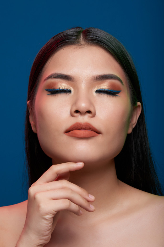 unsmiling,shoulders,bare,chin,liner,posing,closed eyes,vogue,attractive,sensual,vietnamese,full,perfect,gorgeous,adult,feminine,closed,asian,female,sexy,model,finger,mouth,lips,cosmetics,eyes,makeup,face,beauty,fashion,woman