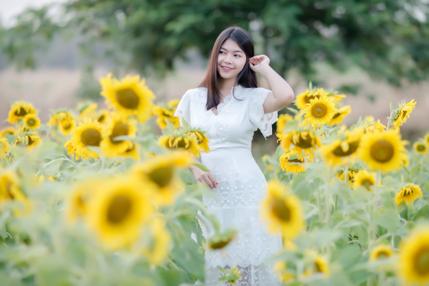 enjoying,canola,wellbeing,cheerful,relaxation,sunflowers,smiling,sunlight,sunny,joy,positive,lifestyle,beautiful,happiness,asian,young,female,freedom,field,walking,sexy,life,sunflower,sunset,healthy,dress,person,yellow,white,women,happy,spring,landscape,beauty,sun,girl,nature,green,woman,summer,flowers,people,flower