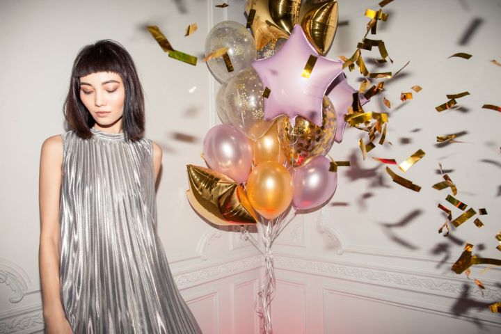 balloons,bangs,beautiful,beauty,birthday,birthday party,celebrate,celebration,confetti,decoration,design,dress,fashion,female,fun,girl,gold,hairstyle,happy birthday,indoors,model,party,person,photoshoot,pink,pose,pretty,short hair,silver dress,style,wear,woman