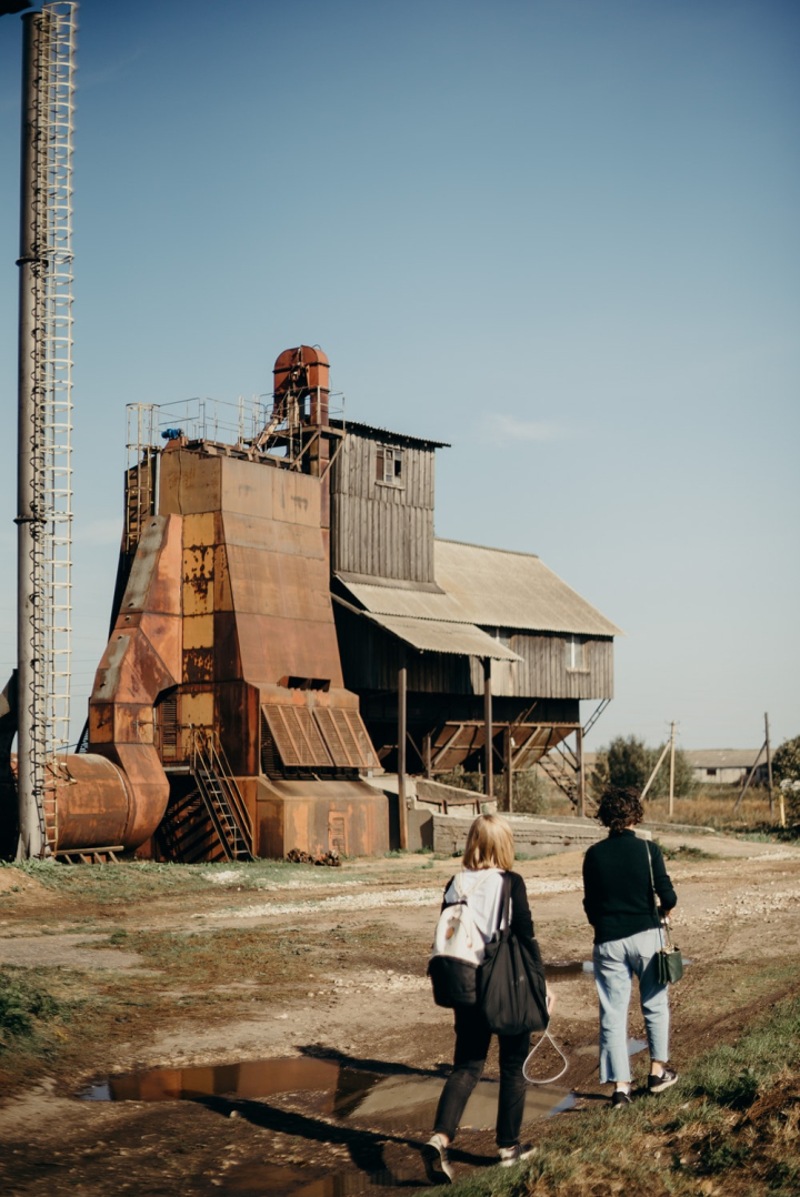 abandoned,building,industrial plant,metal,people,rusty,walking