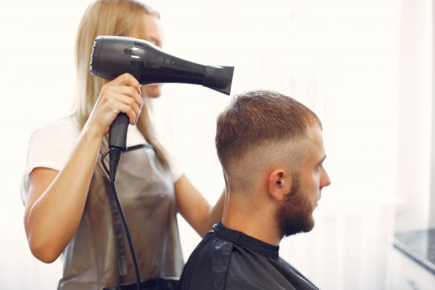 Free: Stylish man sitting in a barbershop Free Photo - nohat.cc