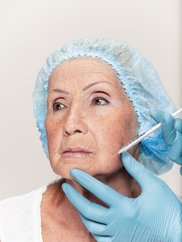 rejuvenation,dermatology,mature,wrinkled,aged,wrinkles,close up,retired,procedure,surgeon,aging,operation,treatment,years,adult,age,facial,senior,close,syringe,surgery,gloves,elderly,problem,up,plastic,female,skin,lady,life,old,healthy,cosmetic,medicine,person,makeup,human,time,face,lines,health,doctor,beauty,medical,woman,people