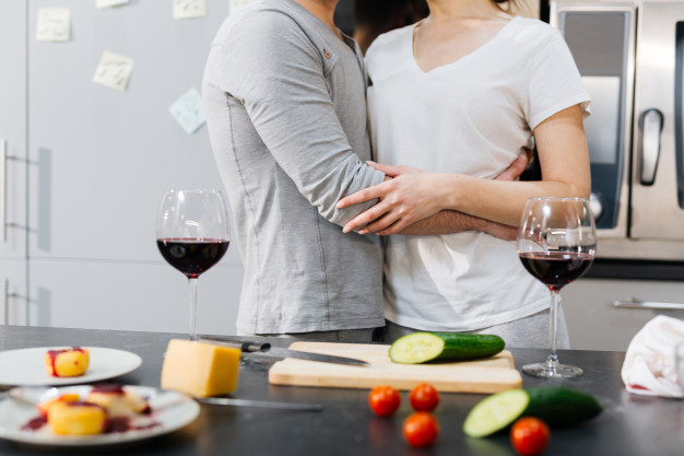 lovestory,amorous,sweethearts,affection,bonding,attraction,husband,embrace,wife,february,wineglass,cuisine,cucumber,day,fresh,together,morning,vegetable,breakfast,drink,cooking,couple,holiday,happy,valentine,wine,home,kitchen,man,woman,love,food