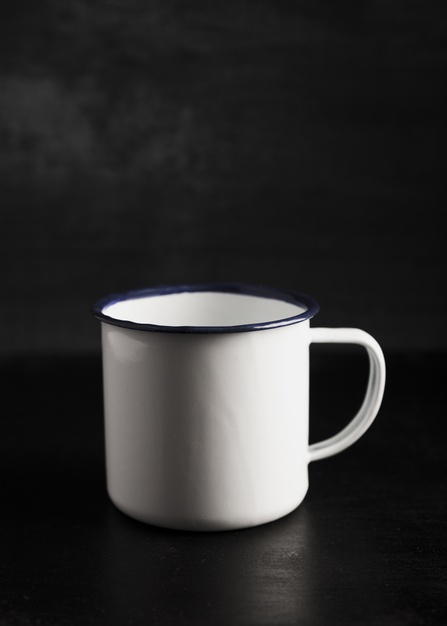 front view,copy space,tea mug,front,copy,beverage,coffee mug,view,liquid,morning,traditional,mug,breakfast,cup,drink,white,tea,black,space,black background,table,light,coffee,background
