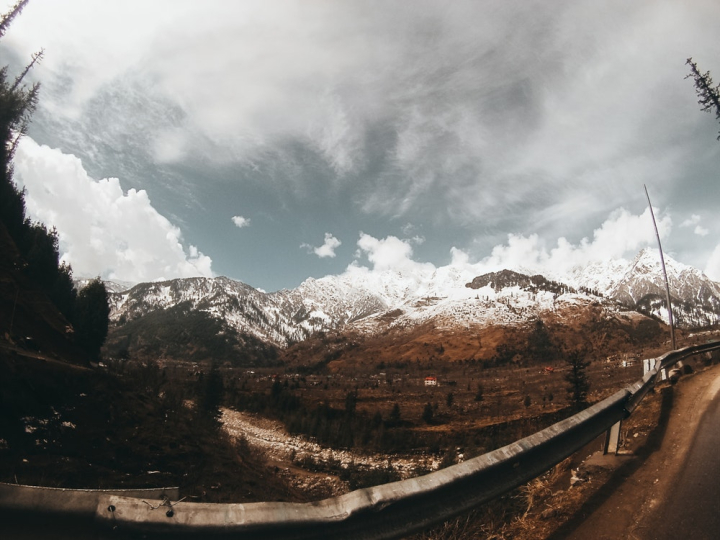 adventure,clouds,cold,daylight,environment,landscape,mountain,nature,road,scenic,sky,snow,wide angle photography