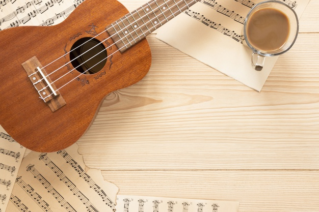 lay,acoustic,instrument,flat lay,musical,sheet,top view,top,view,wooden background,wooden,notes,key,cup,desk,coffee cup,flat,guitar,music,coffee,background