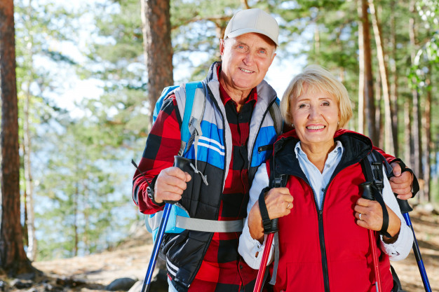 pensioner,aged,retired,sporty,recreation,leisure,looking,smiling,active,trekking,retirement,senior,elderly,activity,hiking,together,outdoor,tourism,adventure,smiley,natural,couple,happy,man,woman,travel
