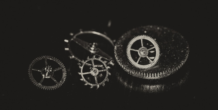 close-up,colors,dark,design,gears,indoors,iron,mechanism,metal,round out,shapes,steel
