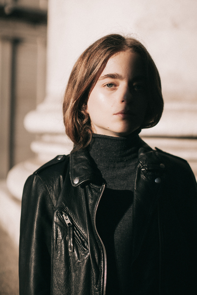 attractive,beautiful,beauty,blur,brunette,close-up,face,fashion,female,focus,girl,glamour,hair,leather jacket,model,person,photoshoot,pretty,serious,shadow,wear,woman,young