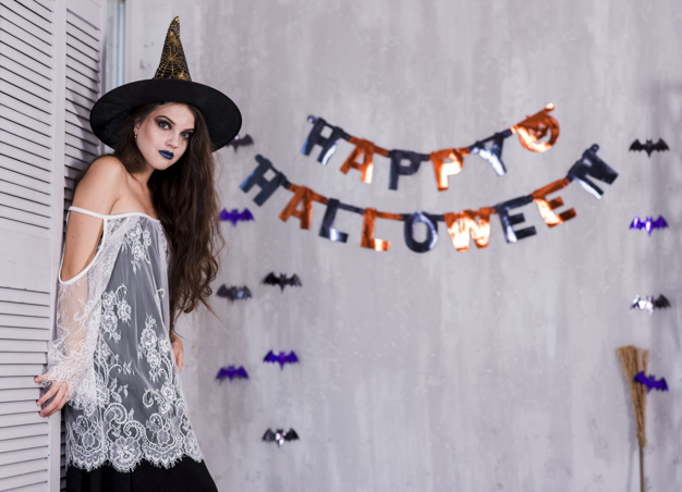 party,halloween,celebration,holiday,hat,pumpkin,model,walking,witch,female,young,horror,beautiful,halloween party,beauty woman,october,costume,dead,scary