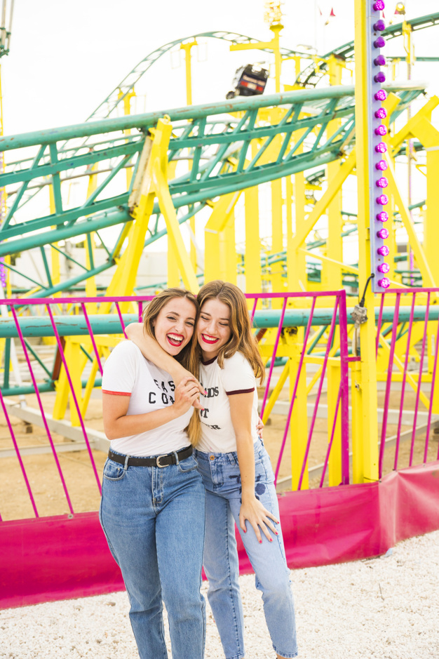 people,hand,smile,happy,holiday,couple,person,happy holidays,friends,modern,park,fun,model,lady,friendship,lipstick,female,together,amusement park,happy people