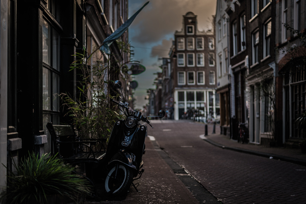 alley,architecture,buildings,daylight,evening,exterior,grass,houses,lights,motor bike,narrow,outdoors,pavement,road,street,town,urban,vintage,windows,Free Stock Photo